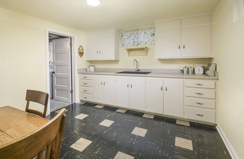 Loveland Casa | Antique-Filled Charming 1940s House on Quiet Downtown Loveland Street. 3 br 2 ba