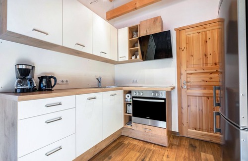 Augustusburg Apartamento | Apartamento 'Blockhaus - Ferienwohnung Sunrise' con jardín compartido, balcón y Wi-Fi