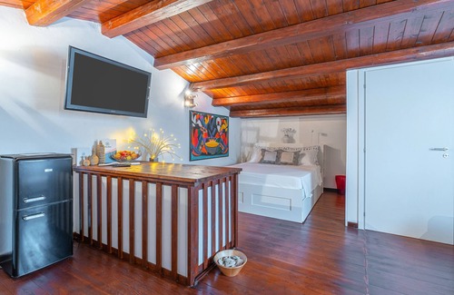 Portopalo di Capo Passero Casa | Apartamento '3 Twins Suite Portopalo' con Jardín Compartido y Aire Acondicionado