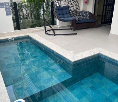 Governador Celso Ramos Apartamento | Apartamento com piscina a 100 metros da praia