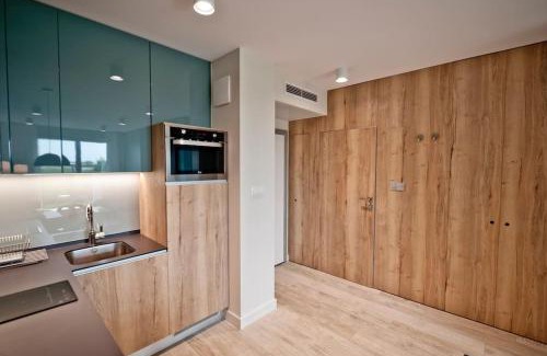 Jastarnia Apartamento | Apartament nad zatoką z ogródkiem