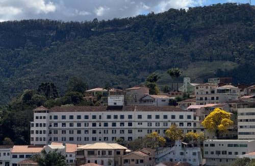 Lambari Apartamento | Apartamento aconchegante em condomínio encantador.
