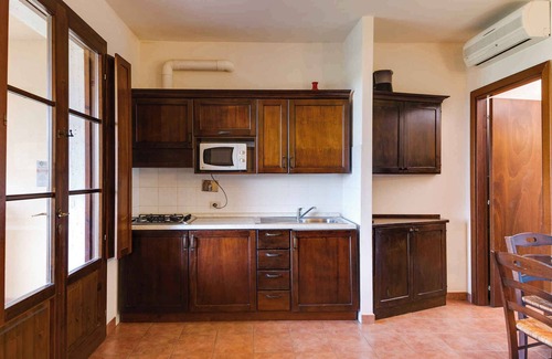 Orbetello Condominio | Apartement with air conditioning and outdoor pool