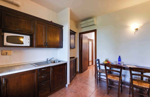 Orbetello Condominio | Apartement with air conditioning and outdoor pool