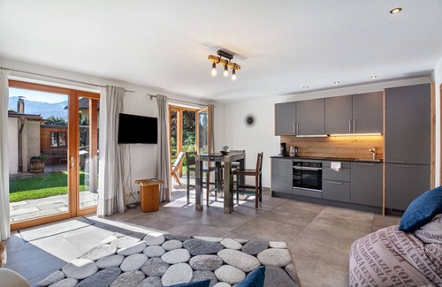 Sonnenbichl Apartamento | Apartamento 'Ferienwohnung Pflegersee' con vistas a la montaña, terraza privada y Wi-Fi