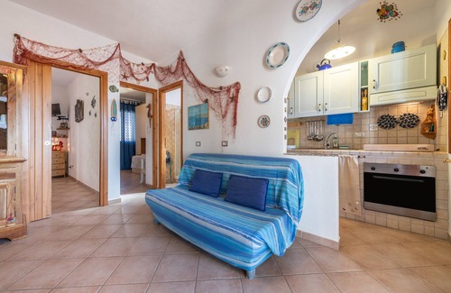 Buggerru Apartamento | Apartamento 'Adriana's House' con vistas al mar, terraza privada y aire acondicionado.