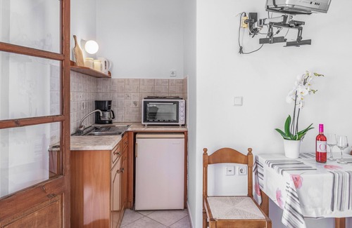 Kamari Apartamento | Apartamento 'Amphitrite -' con vistas al mar, Wi-Fi y aire acondicionado