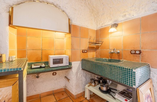 Guadix Apartamento | Apartamento 'Cueva Mar' con vistas a la montaña, piscina compartida y Wi-Fi