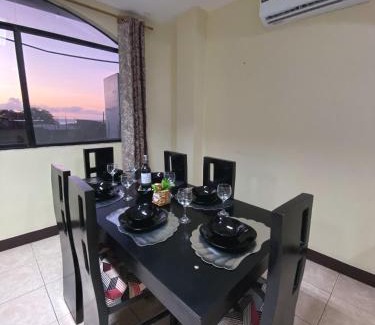 Puerto Baquerizo Moreno Apartamento | Apartment in San Cristóbal with 2 Bedrooms, 6 Beds, Living Room, Dining Room, Kitchen, Private Balcony, Terrace with Ocean View, Washer, Satellite Internet, Near Bars and Restaurants - Blue Horizon - Galápagos Home