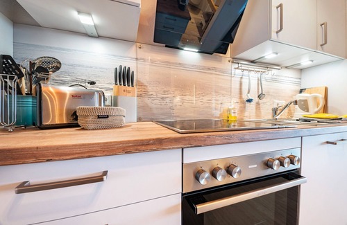 Schillig Apartamento | Apartamento 'Ferienwohnung 25 Strandkorb, 50 Qm' con vistas al mar, balcón y Wi-Fi