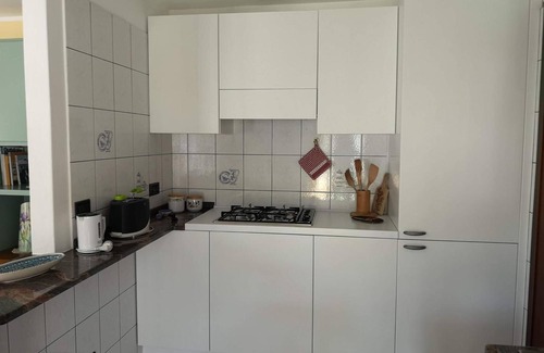 Croveo Apartamento | Apartamento 'Il Glicine' con jardín compartido