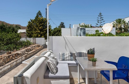 Grikos Casa | Apartamento En Un Hotel 'Pico Bello Patmos 10' Con Vistas A La Montaña, Wi-Fi Y Aire Acondicionado