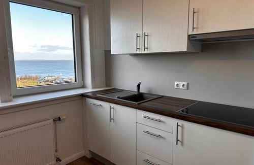 Steenodde Apartamento | Apartment in a unique tidal flat location with sea view