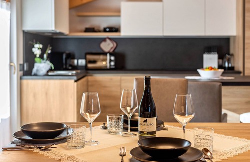 Vigo di Fassa Apartamento | Apartamento 'Majon De Rita' con vistas a la montaña, bañera de hidromasaje y Wi-Fi