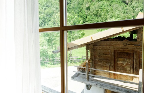 Racines Apartamento | Apartamento 'Schupfe' con vistas a la montaña, jardín compartido y Wi-Fi