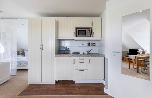 Pellworm Apartamento | Apartamento 'Südwest' con terraza compartida, jardín privado y Wi-Fi