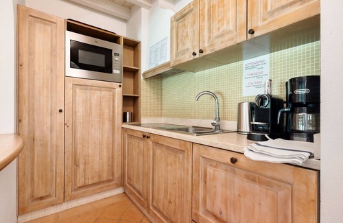 Puegnago del Garda Apartamento | Apartamento 'Topazio' con piscina compartida, Wi-Fi y aire acondicionado