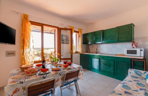 Torre dei Corsari Apartamento | Apartamento 'Torre dei Corsari - Dune d'Oro' con vistas al mar y terraza