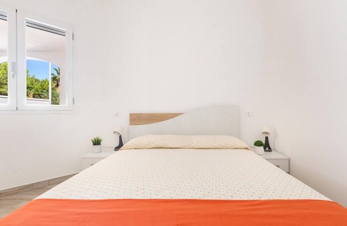 Posto Vecchio Apartamento | Apartment 'Villetta Enjoy' with Private Terrace and Air Conditioning