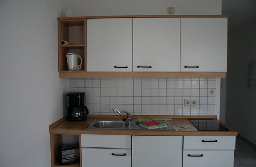 Bad Driburg Apartamento | Apartamento con balcón en la casa de huéspedes Therme-Blick