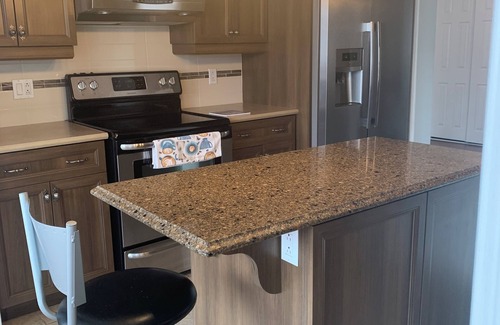 Les Maskoutains Regional County Municipality Apartamento | Apartment with Hot Tub and Backyard. Free Parking.