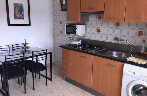 Raxo Apartamento | Apartamento Sinas Playa con wifi, a pie de playa con piscina, parking y barbacoa