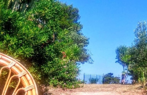 Siniscola Casa | "Appartamento Bouganville 1" con vistas al mar, a 20 m de la playa y terraza compartida