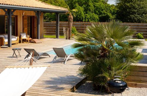 Ares Apartamento | Appartement 2 chambres, terrasse bois indépendante, accès piscine privée