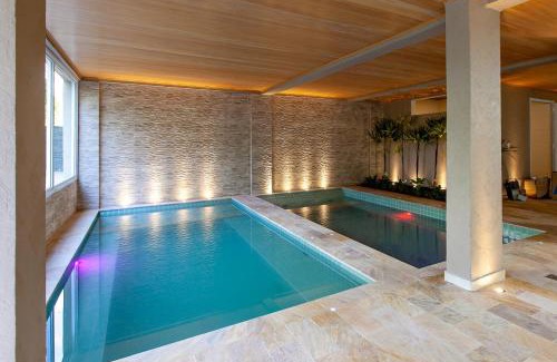 Estufa II Apartamento | Apto 3 Dorms, 1 Suíte, JP2 Home Resort Ubatuba - Churrasqueira Gourmet, Ar Condicionado, Piscinas, Sauna e Salão de Jogos