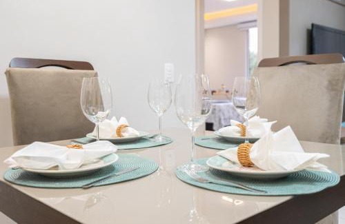 Nossa Senhora da Paz Apartamento | Apto a 150m DA PRAIA e 15min BETO CARREIRO com WI-FI, PISCINA, PORTARIA 24h, PLAYGROUND INFANTIL, QUADRA DE ESPORTES sacada com CHURRASQUEIRA e vaga de GARAGEM
