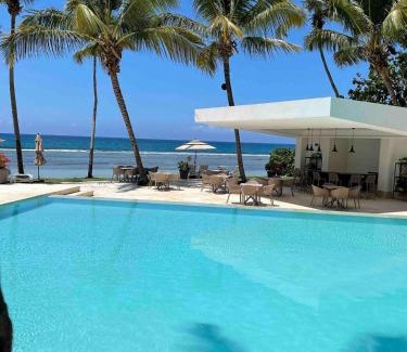 Juan Dolio - El Pueblo Apartamento | Aquarella Beachfront 2BR Sunset Juan Dolio