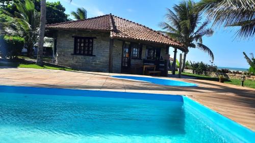 Prado Casa | Bangalô Aconchegante de Frente para o Mar