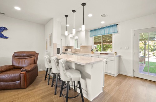 Bay Park Casa | Bay Park Garden Dream - Central Location, AC, Washer/Dryer & Private Yard!