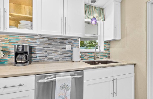 Raymonde Shores Casa | Casa de playa con piscina segundos al mar y al río