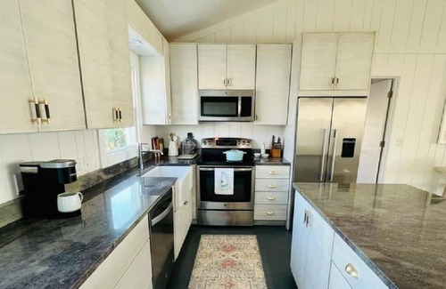South Beach Casa | Beachfront Oasis a Classic Carolina cottage Striking Ocean Views Pet Friendly