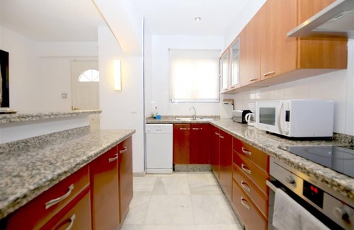 Bahia Dorada Casa | Casa adosada frente al mar con clima y Wifi, En la playa a solo cinco minutos del puerto