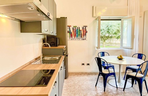Abbadia Lariana Apartamento | Acogedor apartamento para 4 personas con A/C, WIFI, TV, patio y aparcamiento