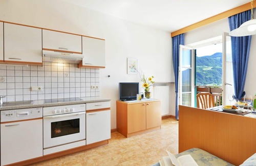 Andriano Apartamento | Hermoso apartamento para 4 personas con piscina, WIFI, TV y patio