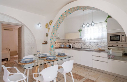 Eden Beach Villa | Precioso apartamento en villa con A/C, WIFI, piscina, TV, patio y mascotas permitida