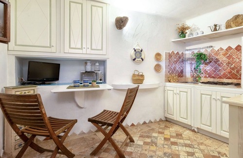 Capo d'Orso Apartamento | Precioso apartamento para 2 personas con A/C, TV y mascotas permitida