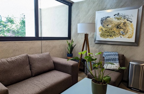 Escandón Apartamento | Beautiful Business Condo in the heart of Condesa | Indoor waterfall