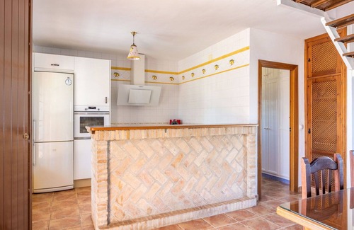 Sanlúcar la Mayor Casa | Preciosa casa de vacaciones privada con piscina privada, A/C, WIFI, TV, patio y mascotas permitida