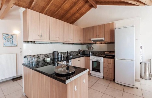 Pelekas Villa | Ver hermosas vistas villa con piscina de borde infinito