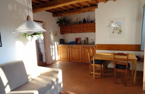 Caldana Casa | Hermosa casa de piedra en la Toscana con terraza y balcón.
