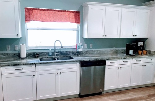 The Villages Casa | Magníficas vistas al campo de golf desde la piscina privada climatizada.