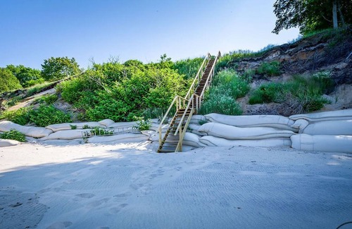 Muskegon Casa | Beautiful waterfront home with 190ft private sandy beach and stunning views