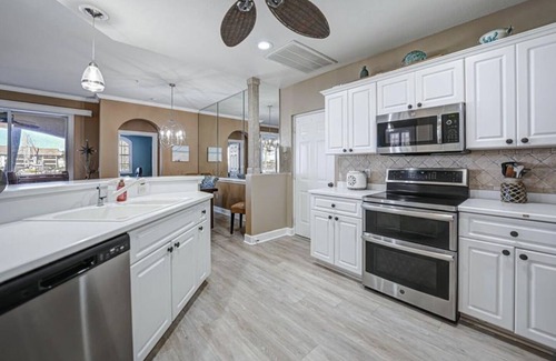 Burnt Store Marina Condominio | Beautifully appointed 3 bedroom condo with amazing marina views!