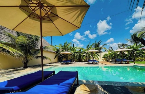 Paje Villa | Bed & Breakfast, Palm Cultural Village Hotel.