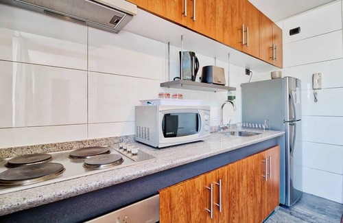 Bellavista Apartamento | Enorme balcón privado, barbacoa, estacionamiento, aire acondicionado y vista a la ciudad