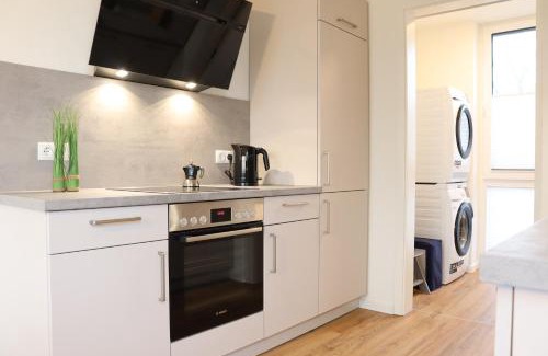 Marienleuchte Apartamento | BeltBlick 19 – Exklusive Ferienwohnung mit Garten und Meerblick